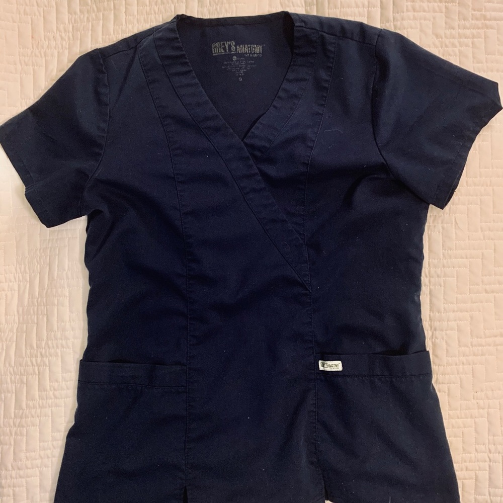 Grey’s Anatomy navy scrub top.